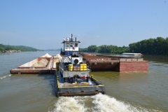 The M/V Wayne C transporting gypsum barges down the Ohio River