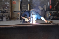 C&B associate welding as part of barge repair work